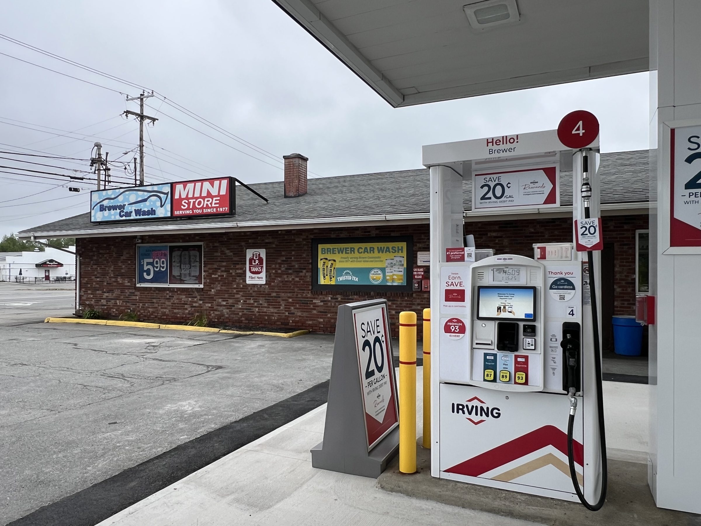 Brewer Car Wash’s brick storefront and gasoline pumps at 521 Wilson Street